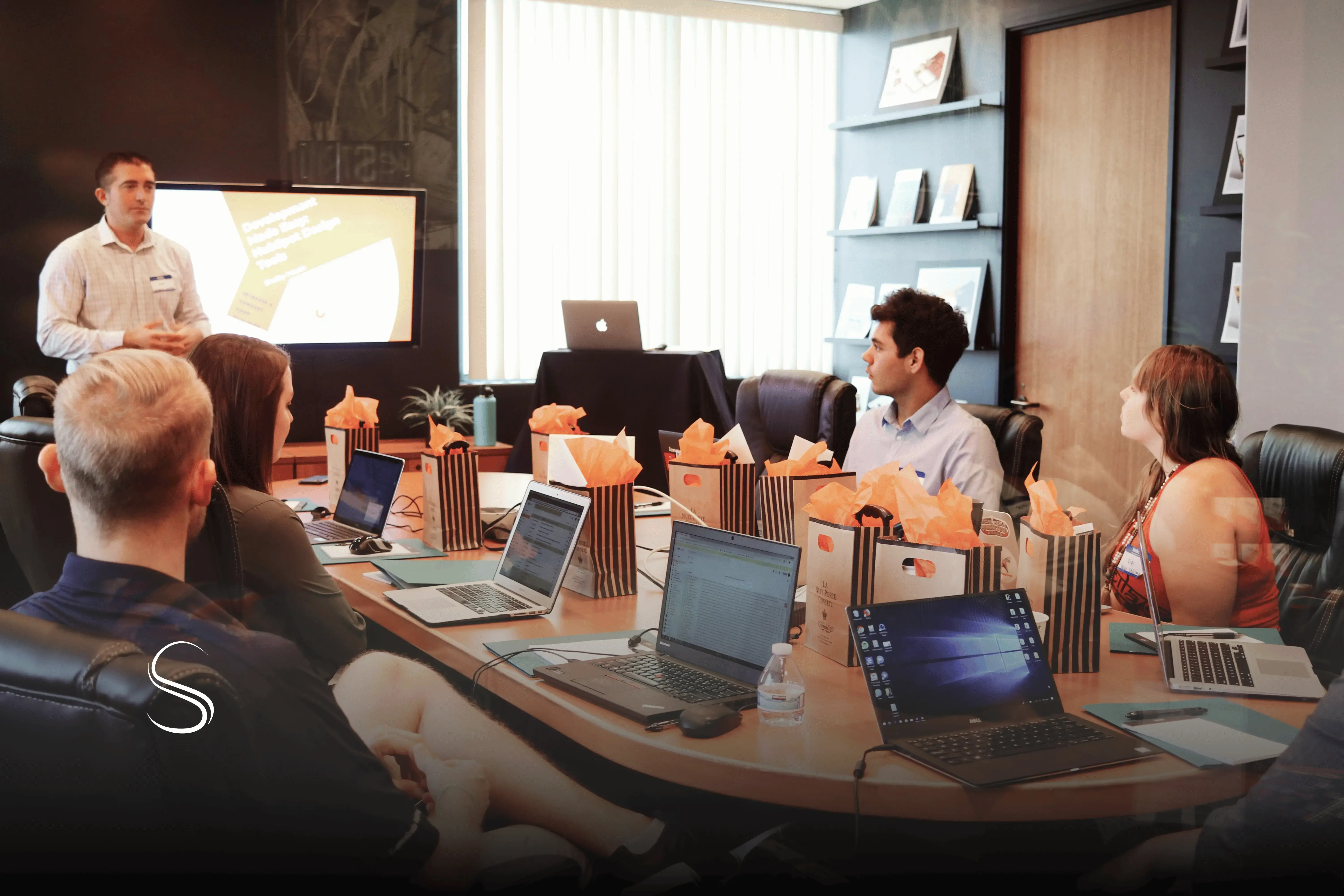 Santisoft team of tech professionals collaborating on innovative software solutions